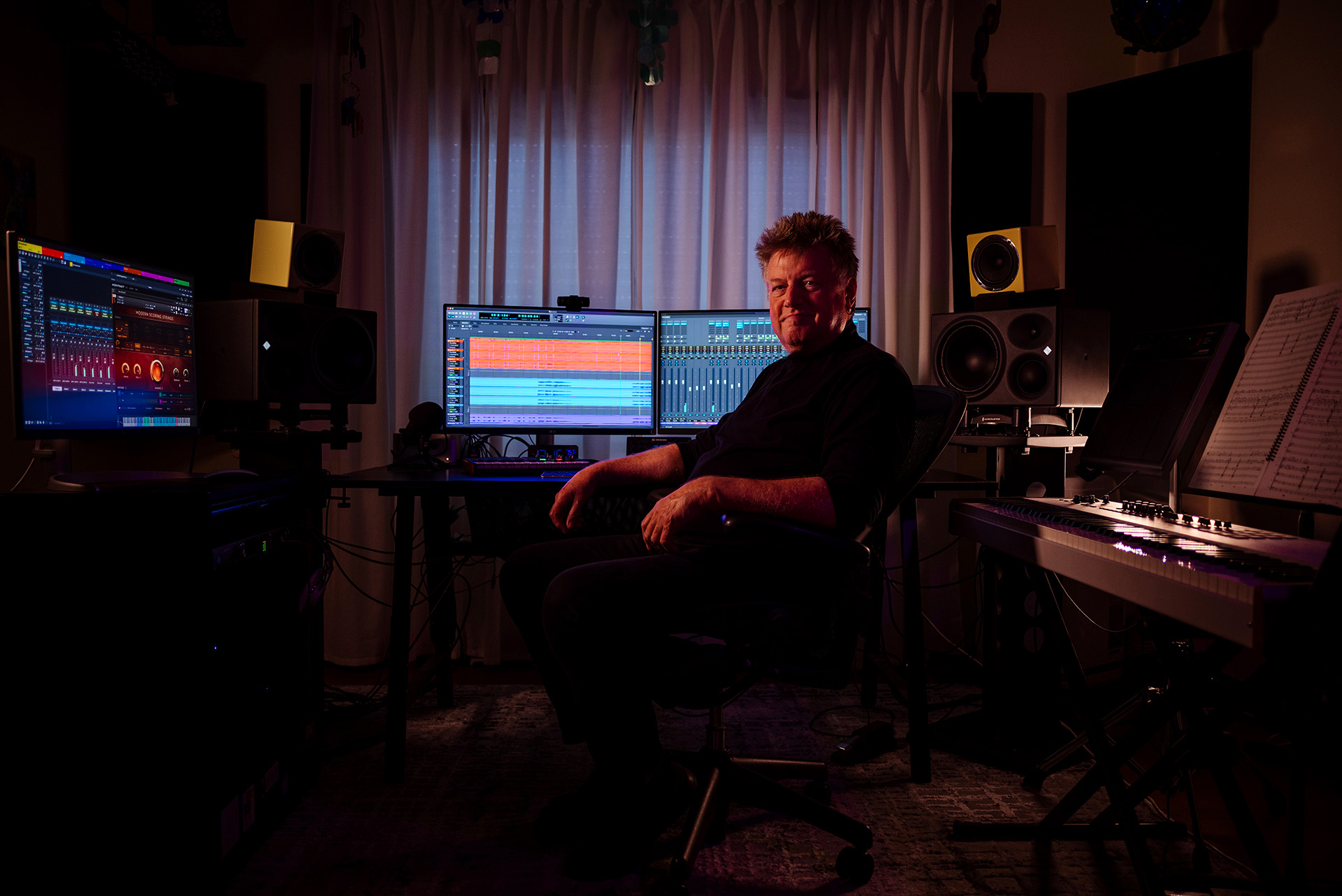 Brian K Shepard sitting in his production studio